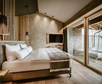 Schlafzimmer in der Fitness Suite im Hotel Bergkristall im Allgäu